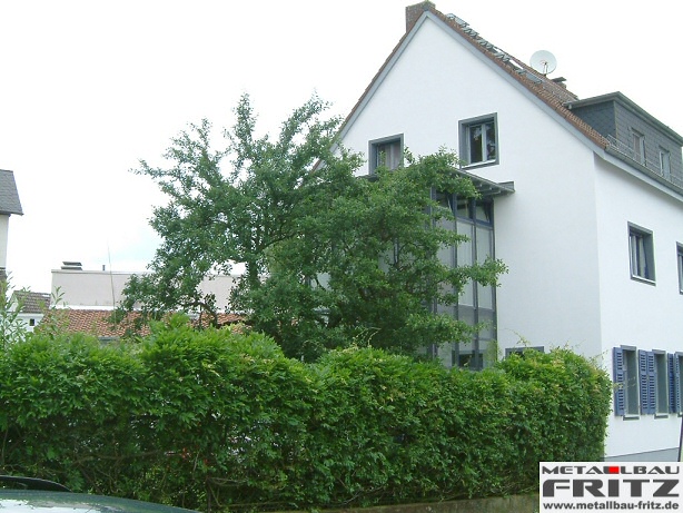 Wintergarten mit einer innenliegenden Geschotreppe - Wintergarten 12-04  -  (c) by Metallbau Fritz